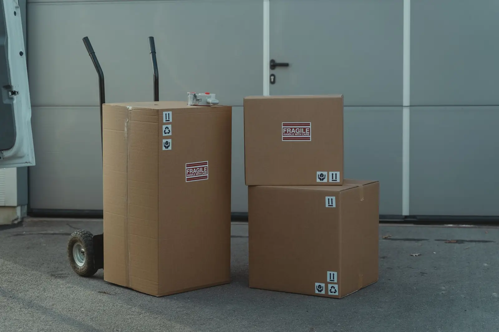 Boxes ready to move on a hand truck in a warehouse