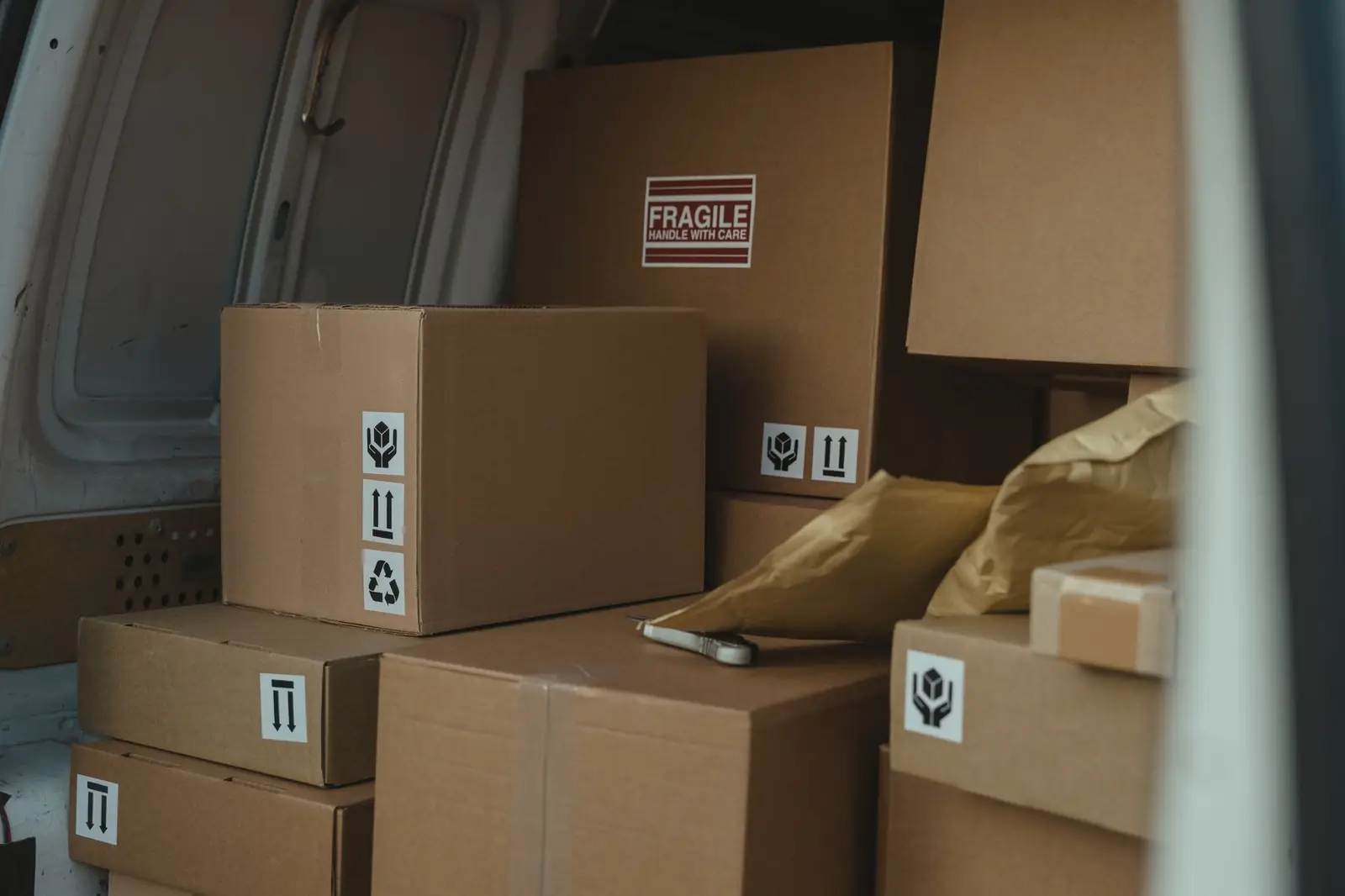 Packed boxes loaded in a delivery van